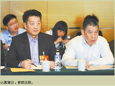 1426216259768074479.png 江西日報(bào)3月12日A03版.png